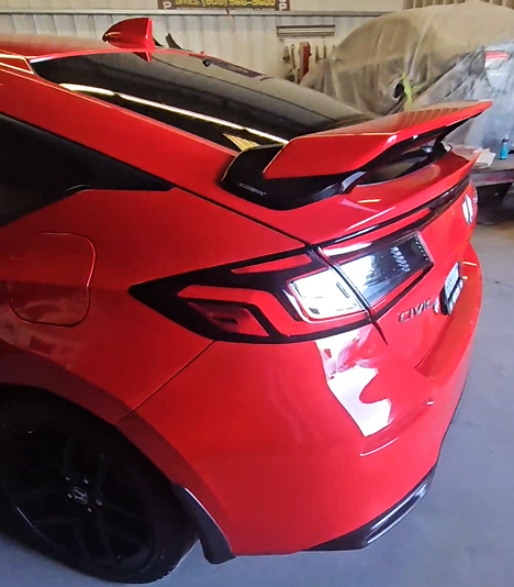 Red car rear corner restored after repair